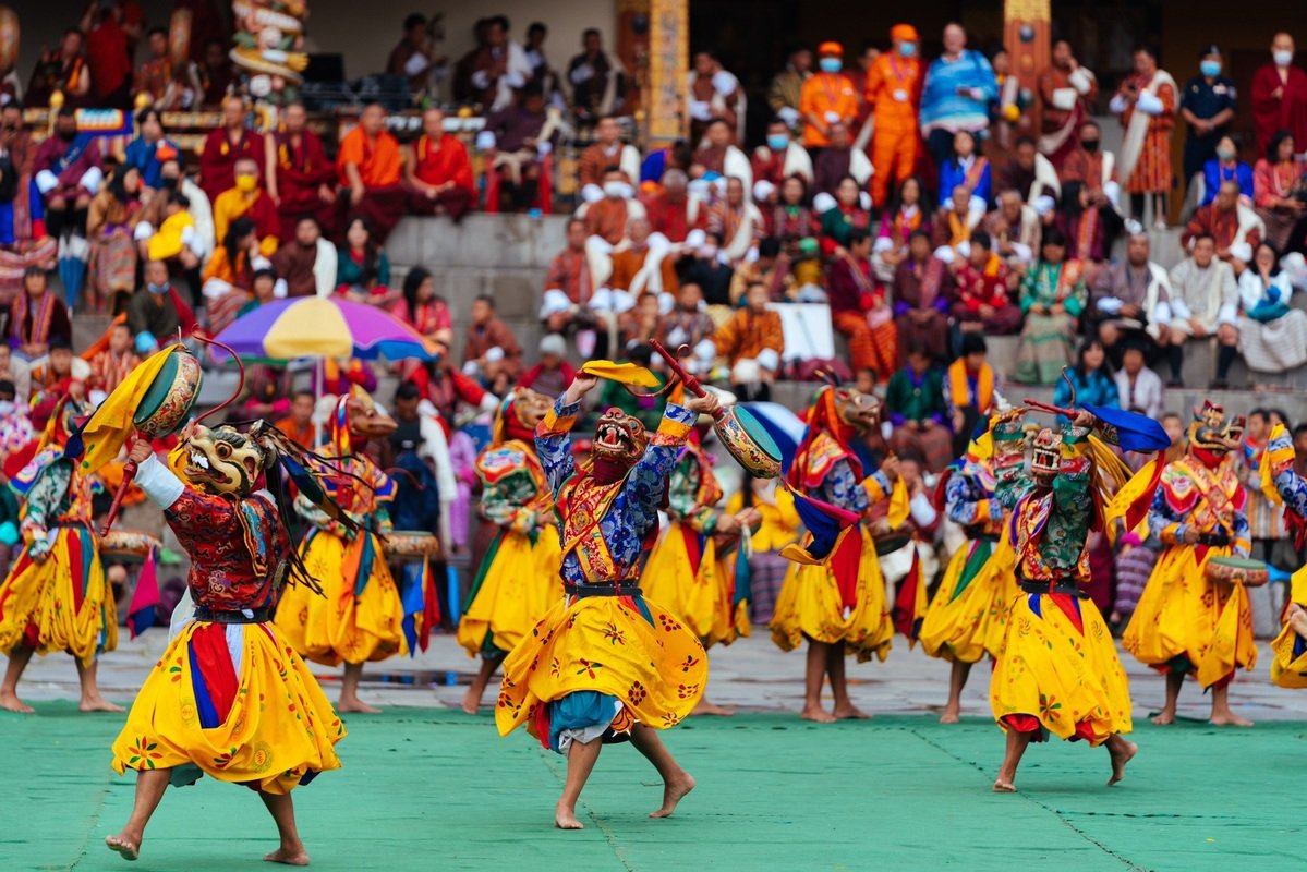 Bhutanese dancers in traditional festival attire